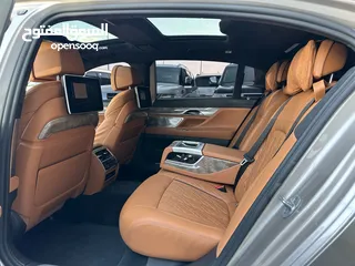  9 بي ام دبليو  750Li XDrive ذهبي داخل زعفراني خليجي