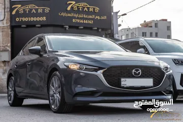  28 Mazda 3 2023 Skyactiv   السيارة وارد و كفالة الشركة و صيانة الشركة و قطعت مسافة 11,000 كم فقط