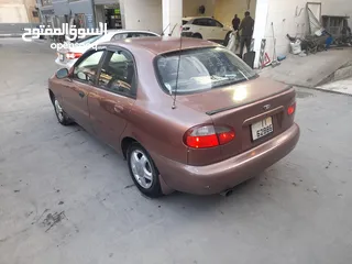  4 دايو لانوس موديل 1997 جير عادي ماتور 1500 سنتر اصلي جنط الاصلي فحص مرفق