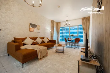  24 دبي لاند SKYCOURT  غرفة وصالة  مفروشة  سوبرلوكس مع بلكونه-إيجار شهري شامل