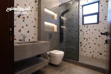  11 شقه مميزه للبيع بعد المدارس العالميه طريق المطار مباشره بسعر مغري تشطيب سوبر ديلوكس