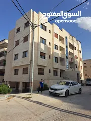  1 شقة خلف كلية بنات اربد و مدرسة ابو بكر