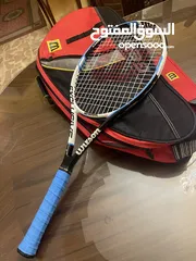  29 كرات تنس إرضي ومضارب