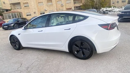  26 تيسلا موديل 2023 tesla model 3 فحص كامل اتوسكور A 2800 مميزة داخل ابيض