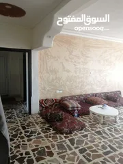  9 منزل للبيع على شارع 100 مطل منطقة جميلة جدا و هاذيه