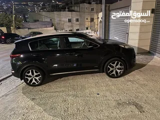  10 كيا سبورتاج بوية شركة بالكامل جي تي بلاك اديشن