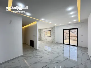 12 شقة طابق ارضي معلقة مساحة 165م بإطلالة دائمة للبيع في اجمل مناطق صويلح بالقرب من الجبيهة