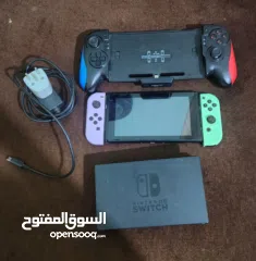  4 نينتندو سويتش مع كينترولارنينتندو سويتش مع كينترولارنينتندو سويتش مع كينترولار