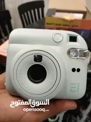  1 السلام عليكم ورحمة الله شباب عندي كامرة instax mini12 بحالة جيدة وكل ملحقاتها متوفرة ولكارتونه مستخد