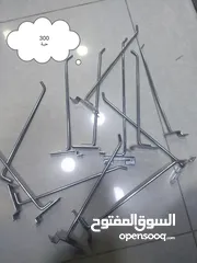  1 علاقة ملابس مع هوكات تعليق ملابس مع ستاندات بحال الوكالة للاتصال