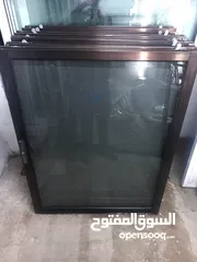  8 شبابيك المنيوم لون برونز زجاج برونز متوفر عدة مقاسات  بحال الوكاله