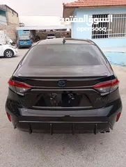  18 TOYOTA COROLLA HYBRID2024 (NIGHTSHADE EDITION)