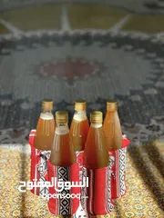  1 عسل السـدر ( التربية) الفرزة الثانيه من مناحل ولاية الحمراء ومضمون 100 % وبدون اضافات نهائياً