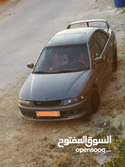  1 لانسر موديل  99 توماتيك وارد  خليجي ماتور 1500دبل كام شفت اللي ناوي ما بقصر معه بعيد عن تجار