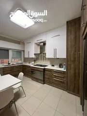  3 شقة مميزة للبيع طابق شبه أرضي 180م داخلي/ 130م خارجي في أجمل مناطق عبدون / ref 9356