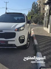  10 سبورتج ماتور 2000 ديزل 4*4 فل اضافات مع بانو راما