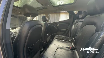  16 2009 ‏Hyundai توسان LX20 اربع ابواب، اللون فيراني، الكراسي جلد والسيارة 92,000 كيلو فقط وبحالة رائعة