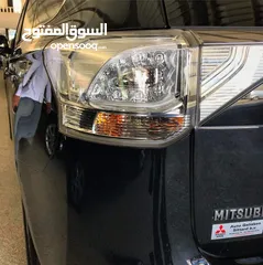  9 ميتسوبيشي اوتلاندر 2014 فل الفل اعلى صنف فيها كل المواصفات لون اسود ملوكي