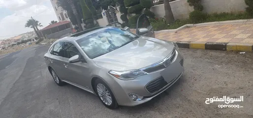  30 تويوتا افالون هايبرد 2015 فل كامل وأعلى صنف Limited وارد و مواصفات أمريكيه مالك واحد فحص كامل