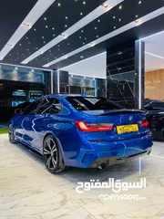  2 BMW - 330i   ///M Package  2020/2019  2000 256h