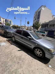  3 اوبل استرا 2004 مطور 16000 قير عادي