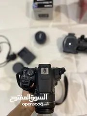  10 كاميرا كانون 850d وعدسه 50mm وستاند تصوير
