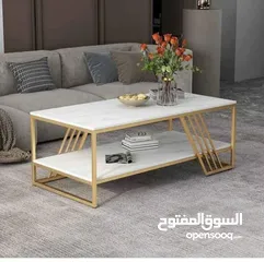  4 طاولة قهوة عصرية بتصميم فاخر  تجمع بين الأناقة والعملية لتضيف لمسة جمالية راقية لغرفة المعيشة.