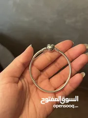  2 اساور باندورا الاصليه فضة و دهبي شامل الفل بكج