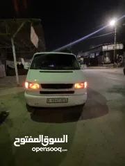  4 باص كرافيل للبيع موديل 2000 دهان جديد وغرفة جديدة كراسي منجدة جلد غرفة كحلية جنط باسات تعتيم كامل