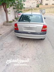  3 اوبل استرا 2004 لون سلفر
