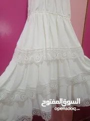  6 فستان ابيض و جاكيت خمري