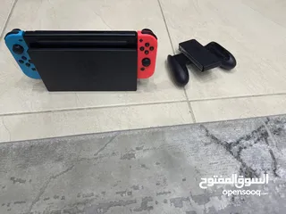  1 Nintendo switch with controller and 3 games