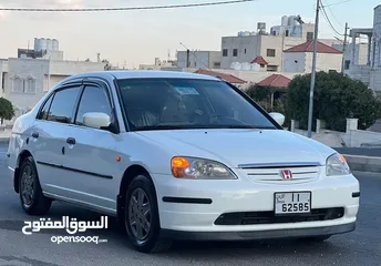  2 هوندا سيفك 2003 مالك واحد بحالة الوكاله  الفحص 3 جيد وحد قصعه