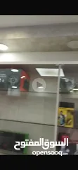  3 اثاث كامل لمحل اكسسوارات ومستلزمات اجهزة الحاسوب ، رفوف وخزائن وتعليق ، ورفوف سوكوريت