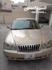  1 كيا اوبتيما موديل 2003