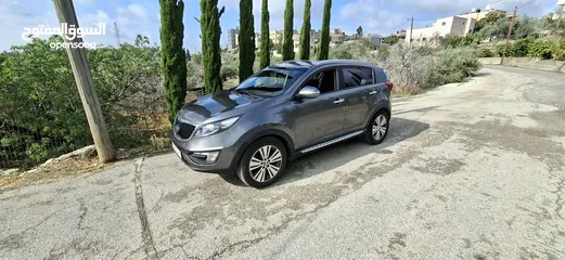  7 جيب كاياسبورتاج موديل 2014-اتومتيك'دفع 4×4 ماتور 2000ديزل فل فل اضافات ماعد الفتحة - نظيف من الاخر