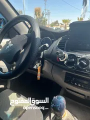  5 l200 موديل  2009 فحص كامل مالك ثاني من الحره ماشيه 226 الف