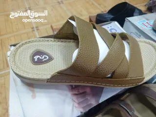  23 محل ملابس قطنيات اصلية واحذية طبية جلد اصلي