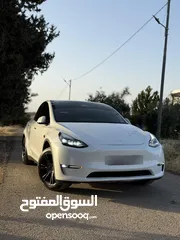  4 تيسلا مودل واي موديل 2023 لونغ رينج دوال موتور فحص كامل بحالة ممتازة قابل للبدل على سياره اقل ثمن