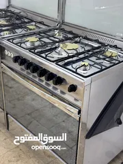  12 غاز افران يونيفيرسال بسعر مرتب ستانلس كامل وجوانب ستانلس