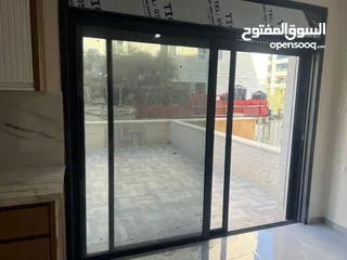  2 شقه للبيع مع حديقه في عين منحد