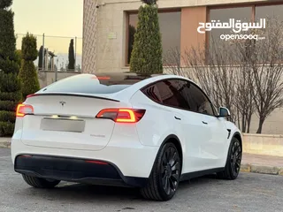  9 تيسلا موديل y 2022 فل كامل اعلا فئه بيرفورمنس  فحص كامل جمرك جديد  Tesla model Y 2022 performance