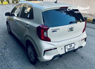  6 بدفعه اولى 1200 تملك كيا بيكانتو مورننج لون بيج موديل 2021  فل اضافات فحص كامل للبيع كاش او اقساط