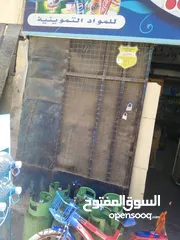  1 باب وشبك توسيع محل