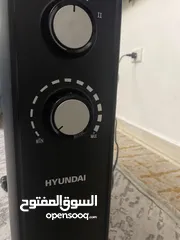  2 ‏صوبه كهرباء مع عجلات ويوجد فيها أربع شعلات لاتصرف الكثير من الكهرباء