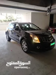  1 كاديلاك SRX للبيع لون اسود