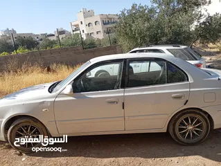  9 سيارة هونداي فيرنا 2003ميكانيكيات جيدة جدا وعيوب بسيطة بالبودي