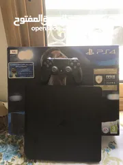  1 Ps4 Slim 1TB with one controller