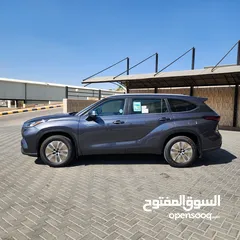  13 2024 Toyota Highlander Hybrid GLE AWD-صنع ياباني