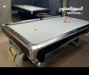  1 طاولتين بلياردو امريكي شبه جداد خشب ثقيل  مستخدمات خمس شهور فقطط بسعرر حلو اتصل وما عليك